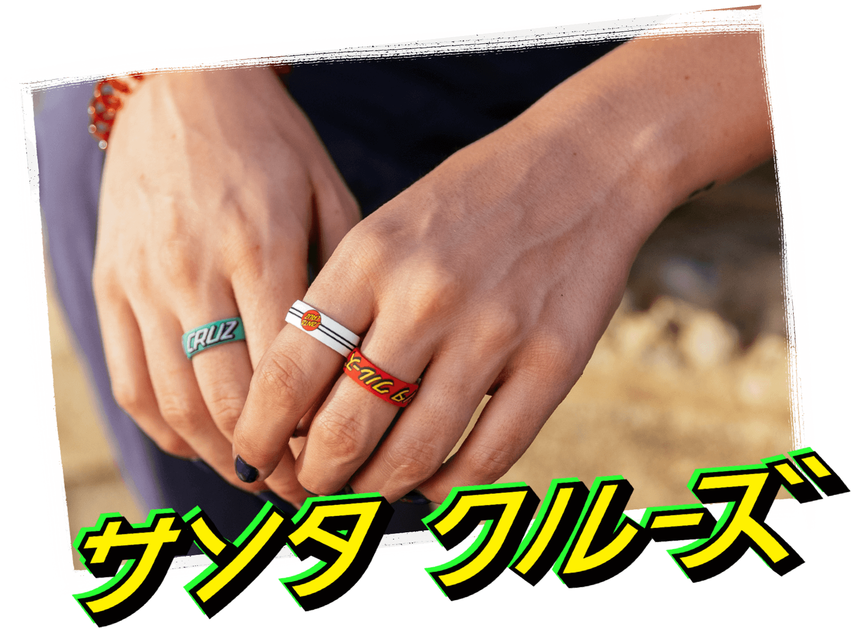 Hand holding skateboard with classic dot black ring