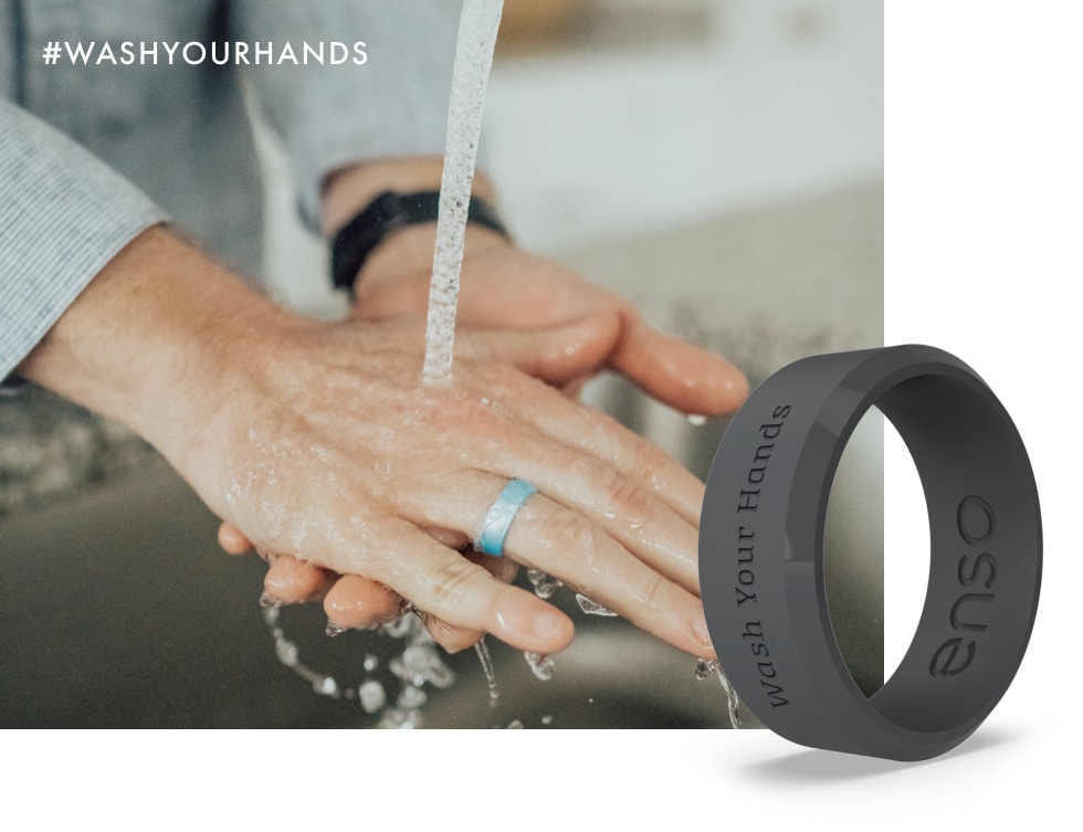 Fight the corona virus by washing your hands like a professional Close up image of a man's hands being washed while wearing a light blue Enso Birthstone Ring