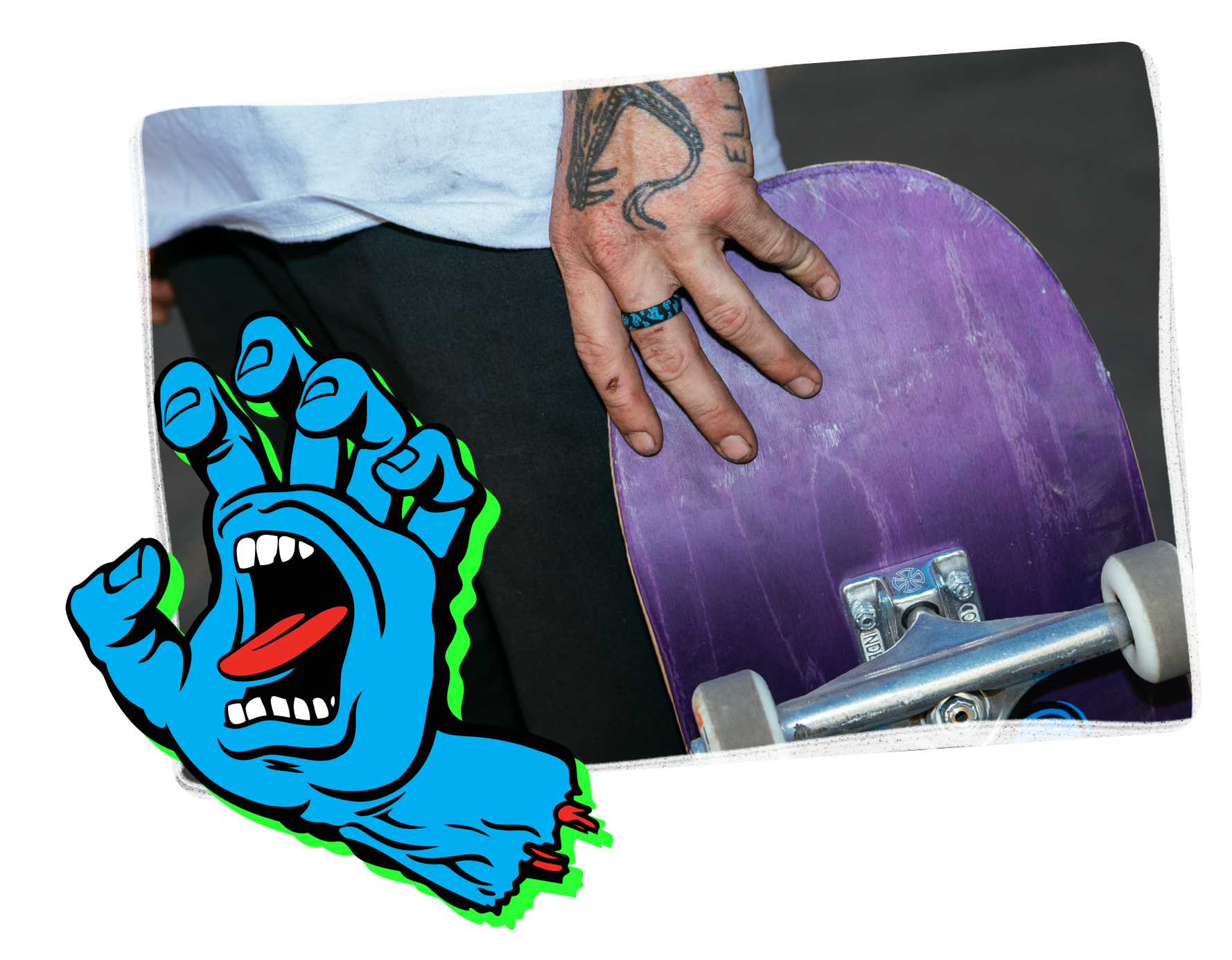 Hand holding skateboard with classic dot black ring